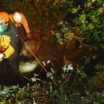 Chloe and Valon, partway up and ready to keep going with help from Michael.