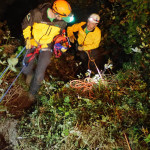 Chloe and Valon, partway up and ready to keep going with help from Michael.
