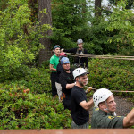 A line of volunteers hauls a rope during the rescue.